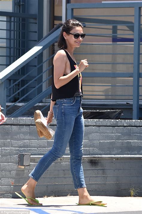 mila kunis pokies|Mila Kunis flashes the flesh as she serves up sideboob in tank top